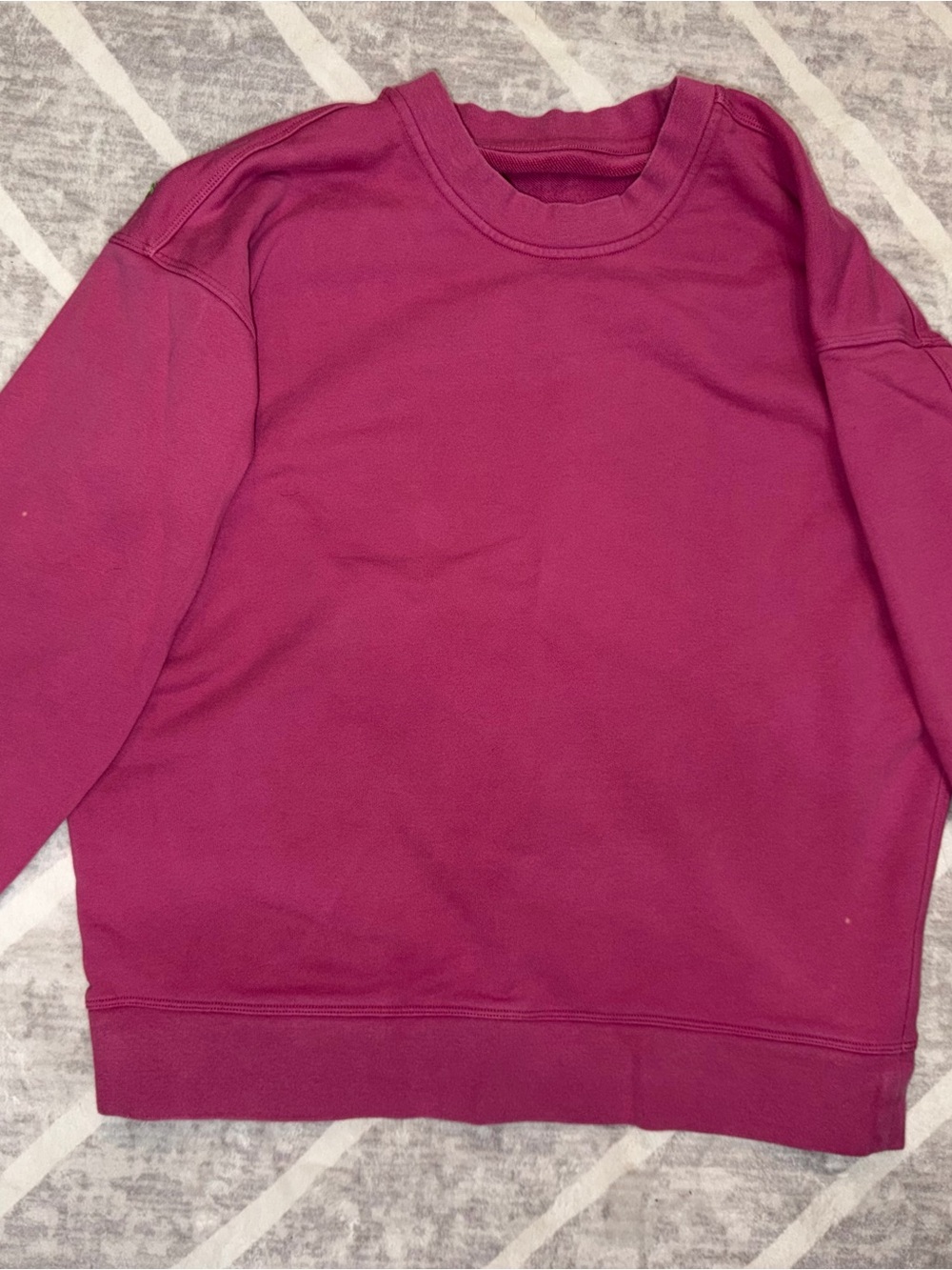 lululemon athletica women’s Crewneck Sweater in Berry- has bleach spots